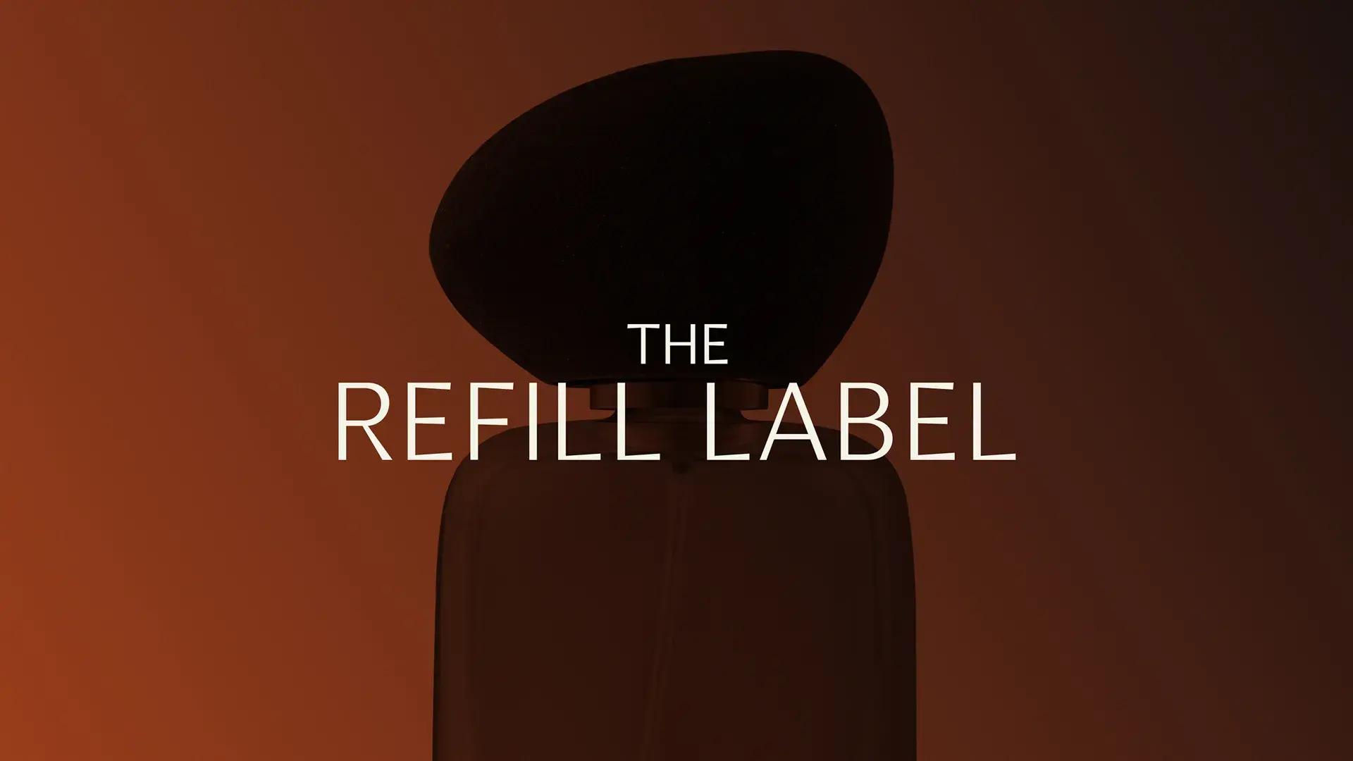Silhouette of a perfume bottle with an oversized cap against a warm gradient background, featuring the text "The Refill Label."