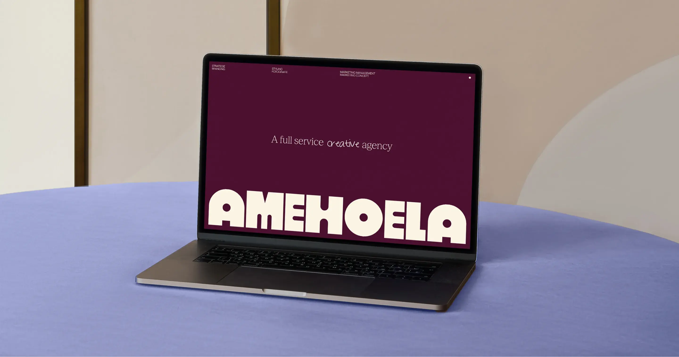 Laptop with purple background