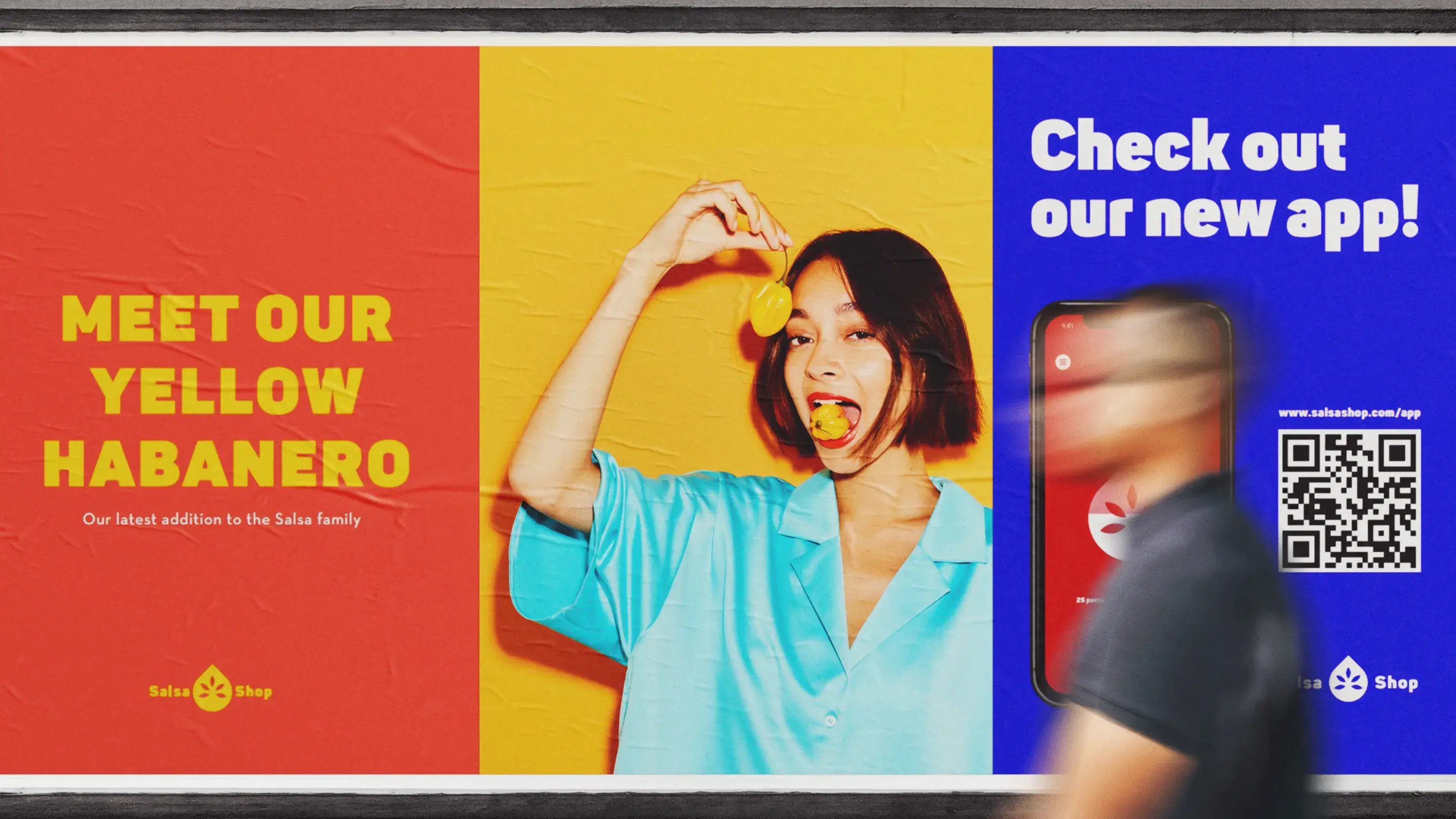 An urban billboard with three horizontal posters in the colors coral, yellow and blue