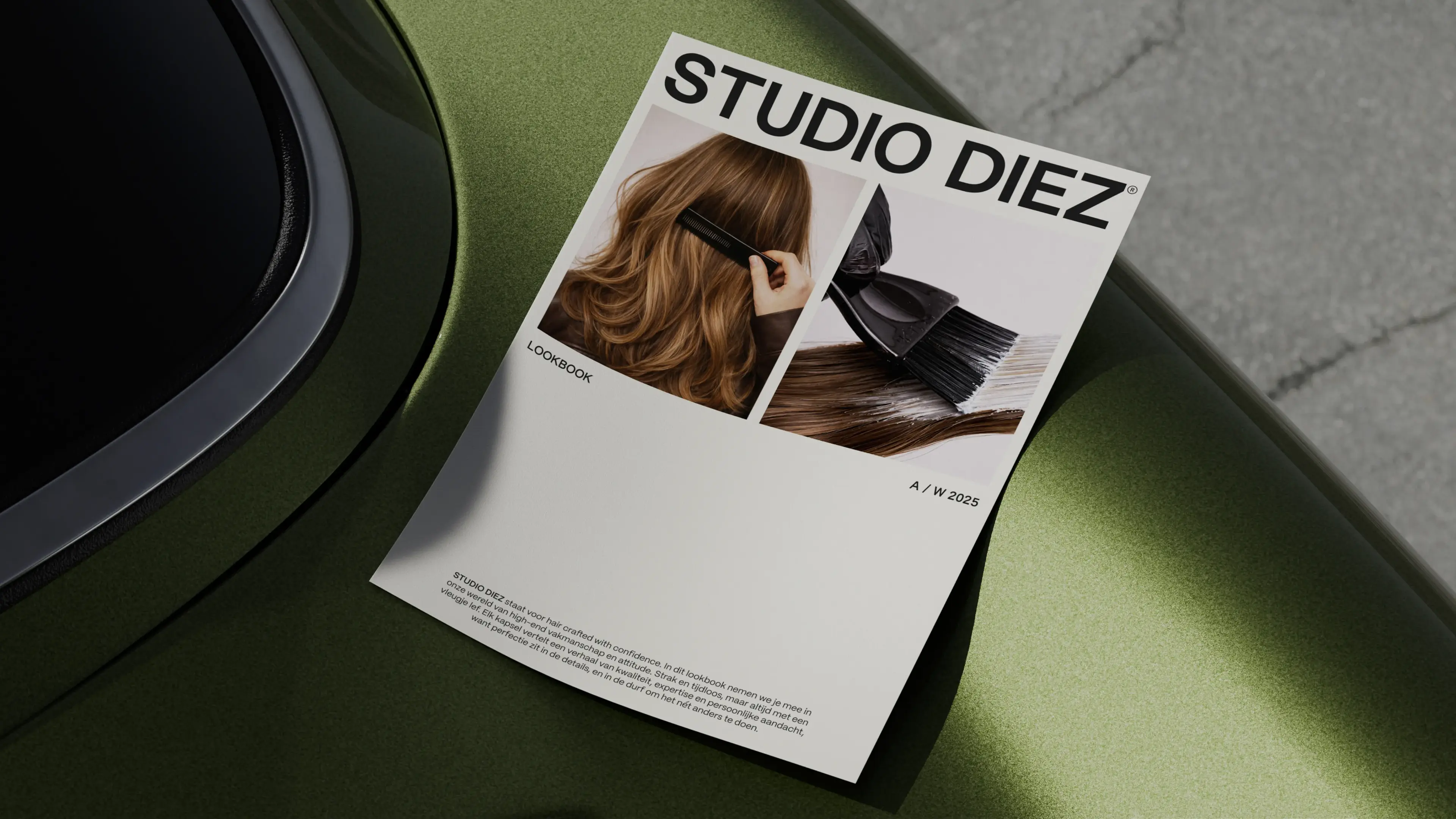 A hair salon lookbook titled "STUDIO DIEZ A/W 2025" on a green car surface, featuring images of hair styling with a brush.