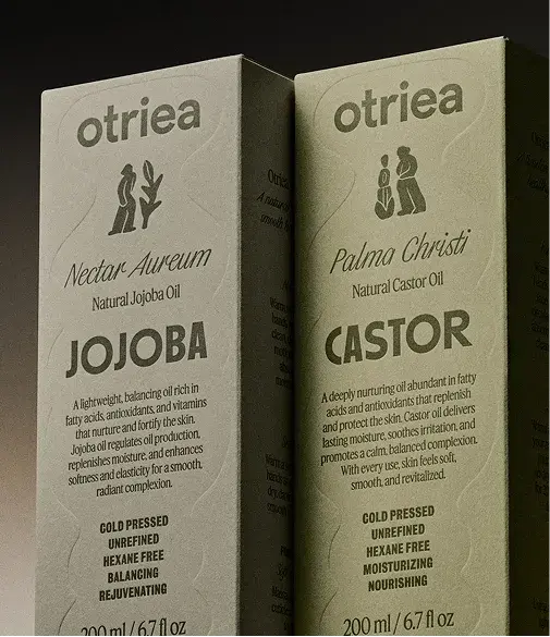 Two bottles of otrea natural oils: Jojoba and Castor, with highlights like cold-pressed, unrefined, and nourishing benefits.