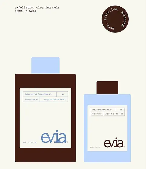 Two bottles of exfoliating cleansing gels with labels, one brown and one light blue. Text reads "effective, balanced, pure."
