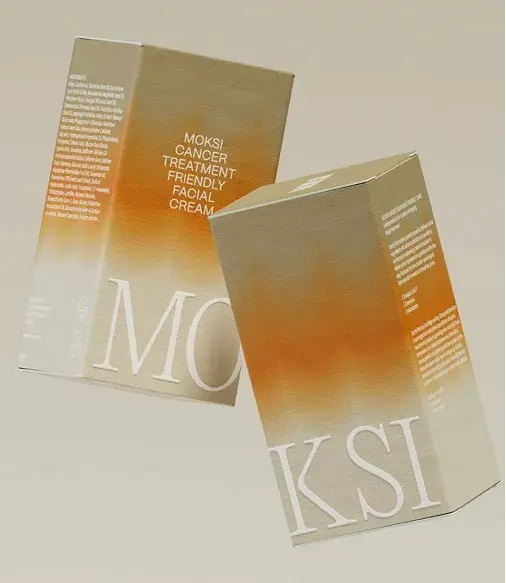 Two boxes of Moksi Cancer Treatment Friendly Facial Cream with gradient design and white text on a beige background.